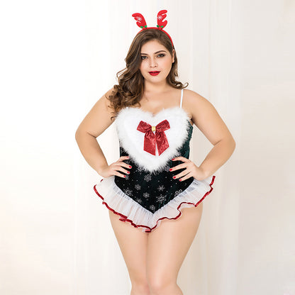 Woman wearing a Christmas-themed lingerie set with reindeer antlers on a white background